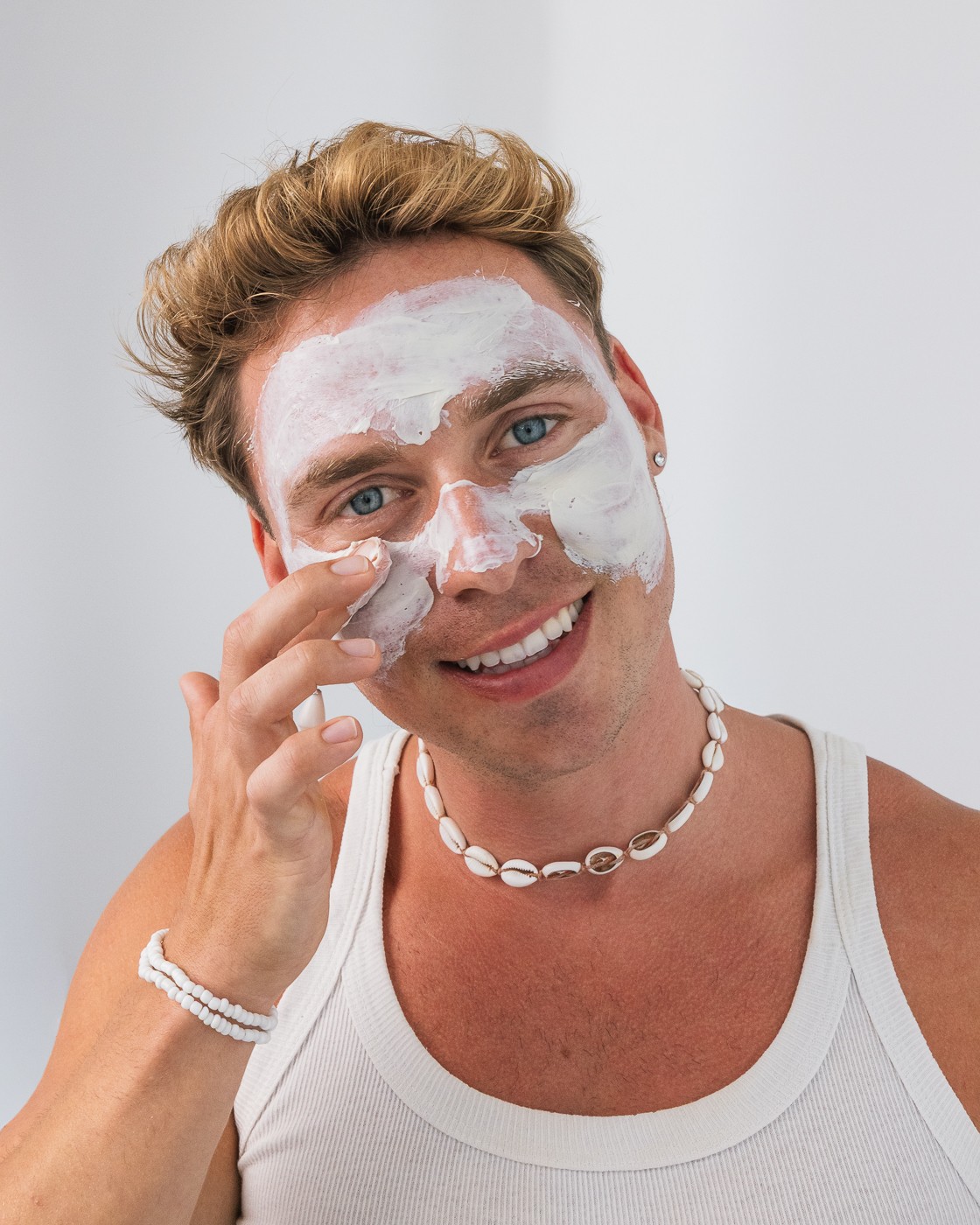 Toni applying a skincare mask